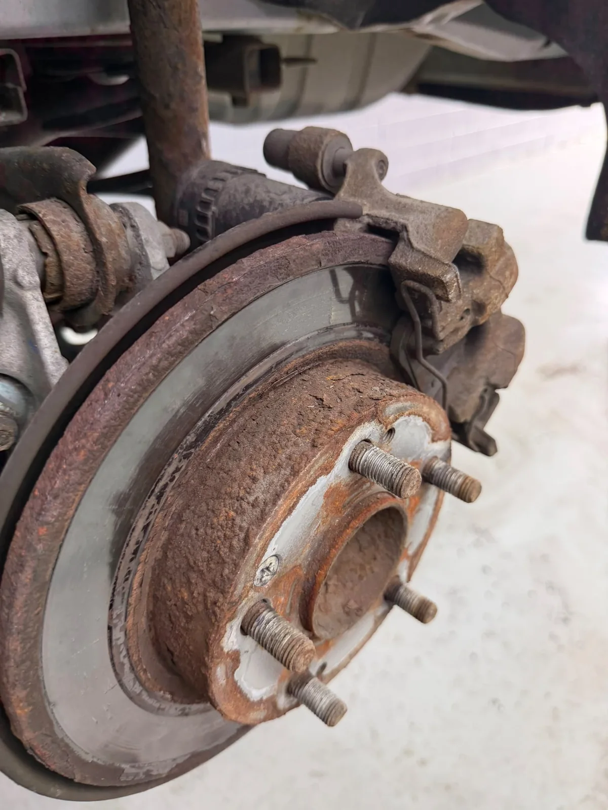 Brake rotor before repair at Motorlux Auto Repairs